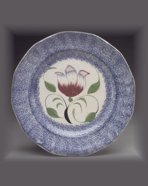 Blue spatter plate with tulip
